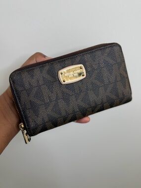 Michael Kors Dark Brown Monogram Zip Wallet with Gold Plaque